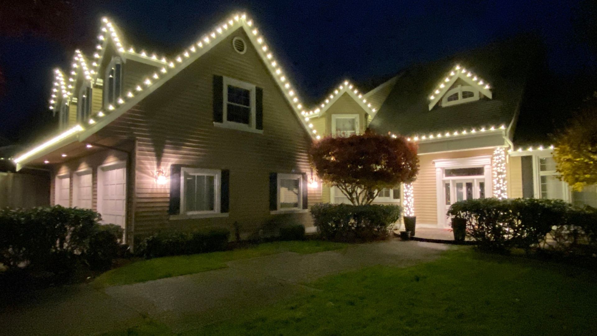 Custom Christmas light display installed by Jolly Christmas Lights